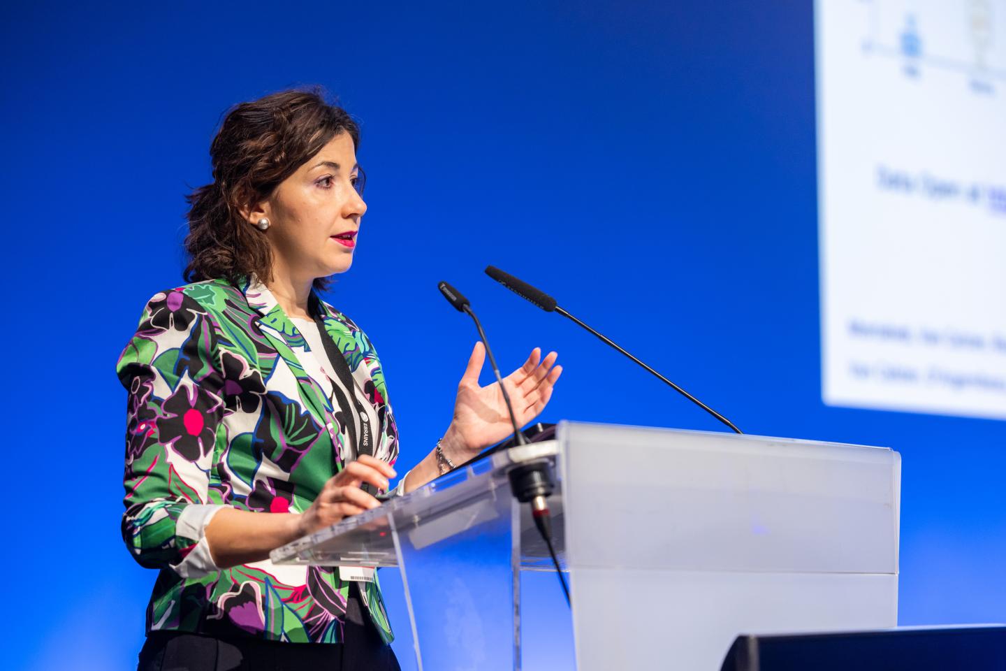 Researcher speaking at scientific conference