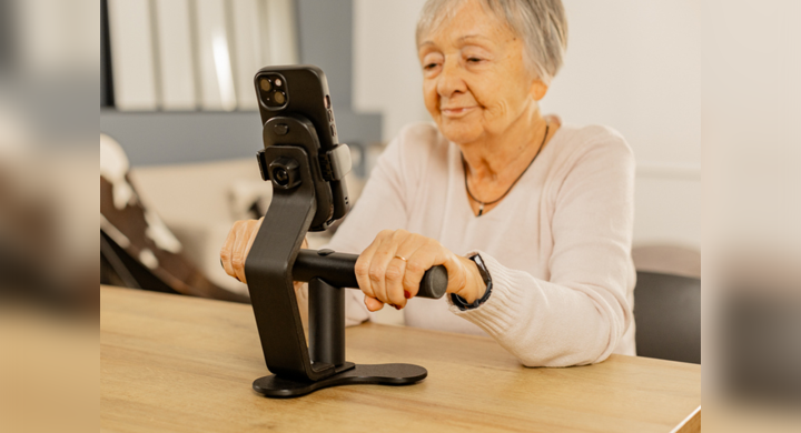 Image of woman using an at-home rehabilitation device