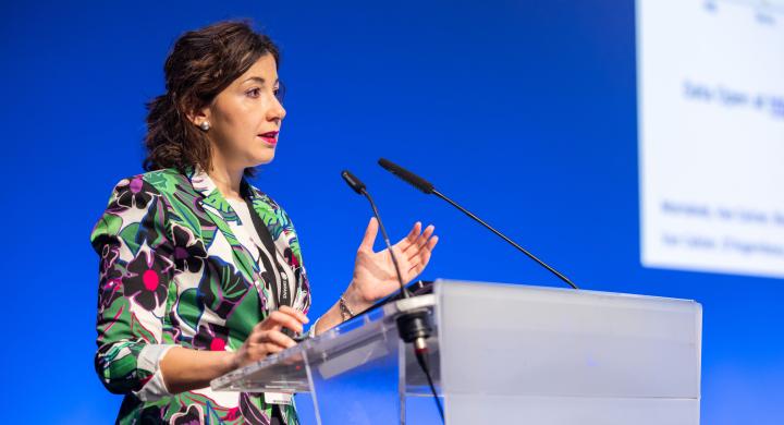 Researcher speaking at scientific conference