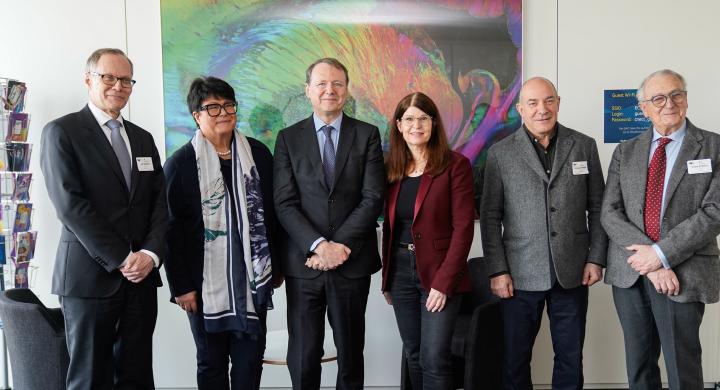 Group photo from the HBP-EBRAINS Exhibition featuring Jan Bjaalie, Sabine Verheyen, Roberto Viola, joint-CEOs of EBRAINS Katrin Amunts and Phillippe Vernier as well as chairman of the board André Syrota