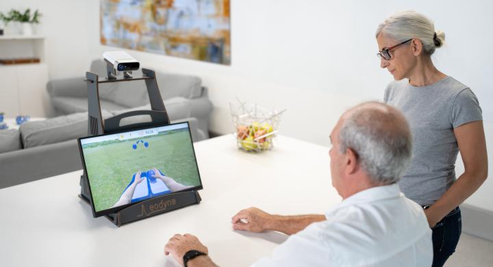 Photo of man using rehabilitation technology