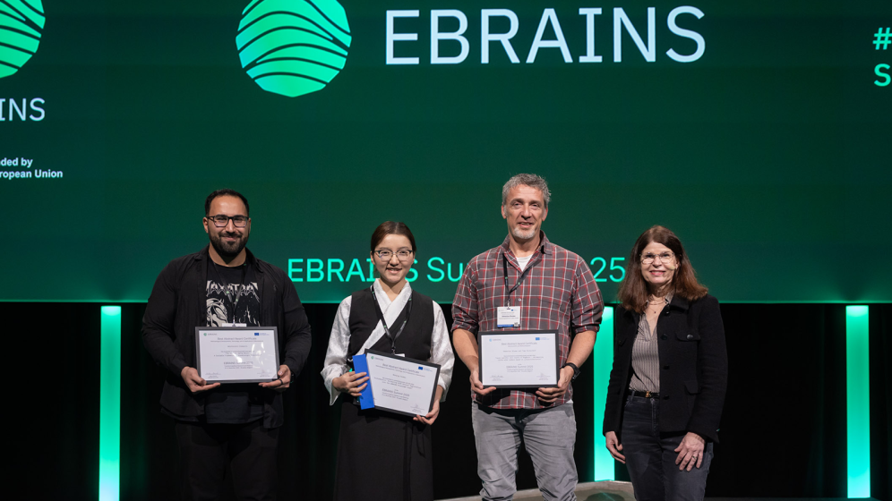 Photo of Best Abstract Award Winners with Katrin Amunts