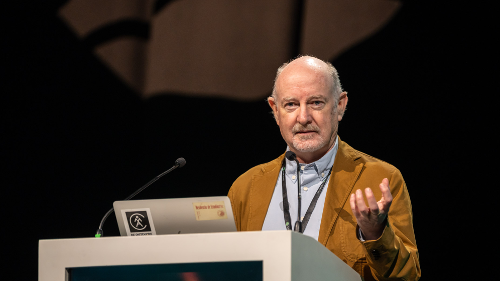 Photo of Rafael Yuste delivering his keynote presentation at the EBRAINS Summit 2025