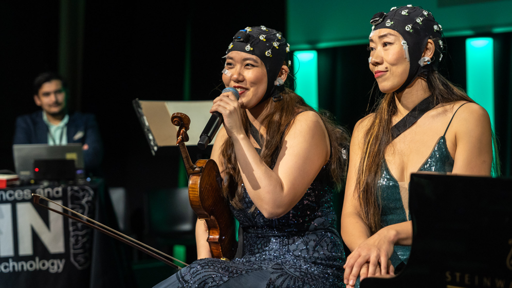Photo of Stella Chen and Mei Rui performing