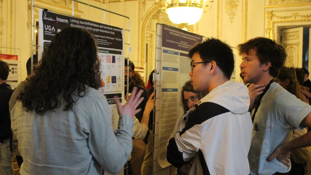 Photo of poster presentation at the EBRAINS Student Conference 2026